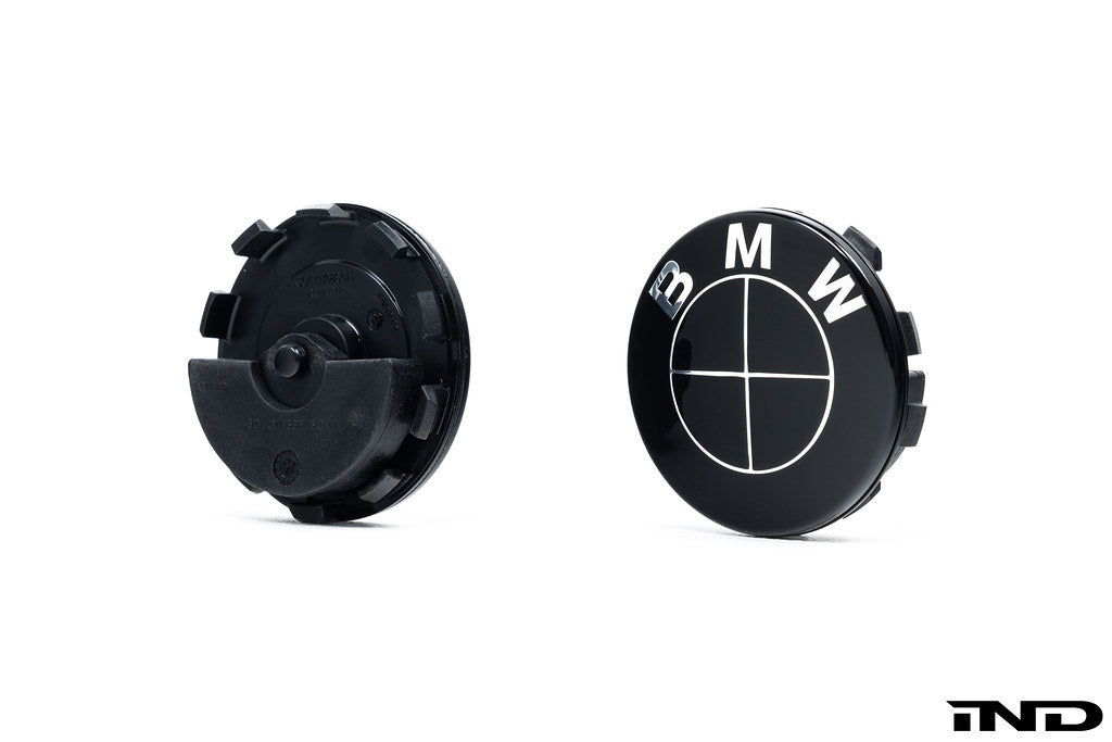 front and rear view of 2 center caps