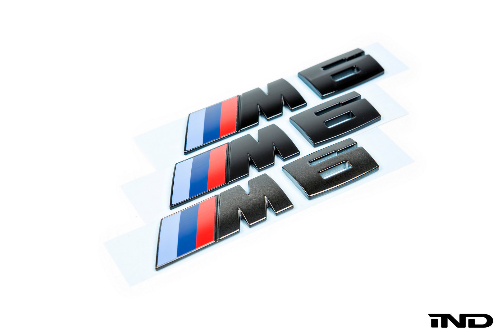 iND f06 f12 f13 m6 painted trunk emblem - iND Distribution