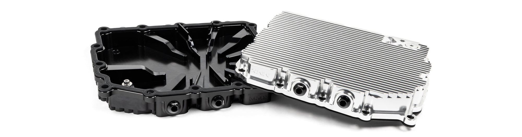 MMX Performance aluminum BMW DCT oil pan installed underside showing billet construction and cooling fins