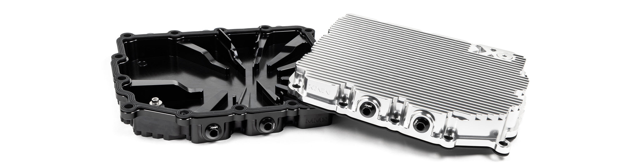 MMX Performance aluminum BMW DCT oil pan installed underside showing billet construction and cooling fins