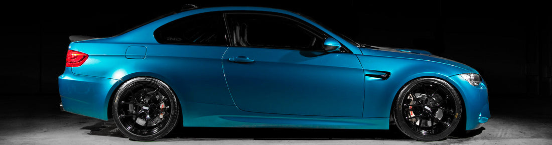Atlantis Blue BMW E92 M3 side profile with BBS FI wheels and motorsport-inspired styling upgrades
