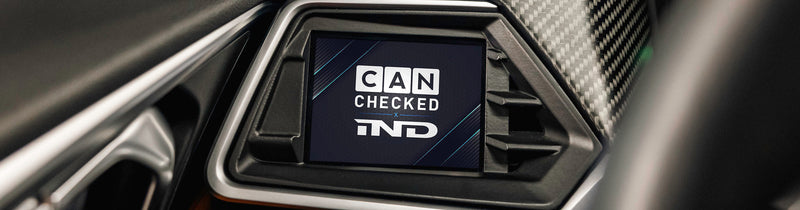 CANchecked multifunction display installed in a BMW G82 M4, showcasing real-time CANbus vehicle data through an OEM-inspired integrated display designed and engineered in Germany.