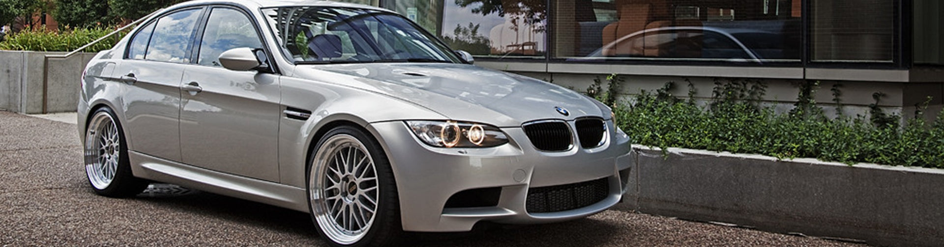 Moonstone Metallic BMW E90 M3 front 3/4 view with BBS LM wheels and OEM+ styling upgrades and custom paint work