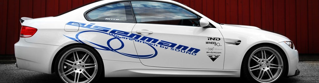 Alpine White BMW E92 M3 side profile view with 360 Forged wheels, Eisenmann exhaust, and Vorsteiner aero