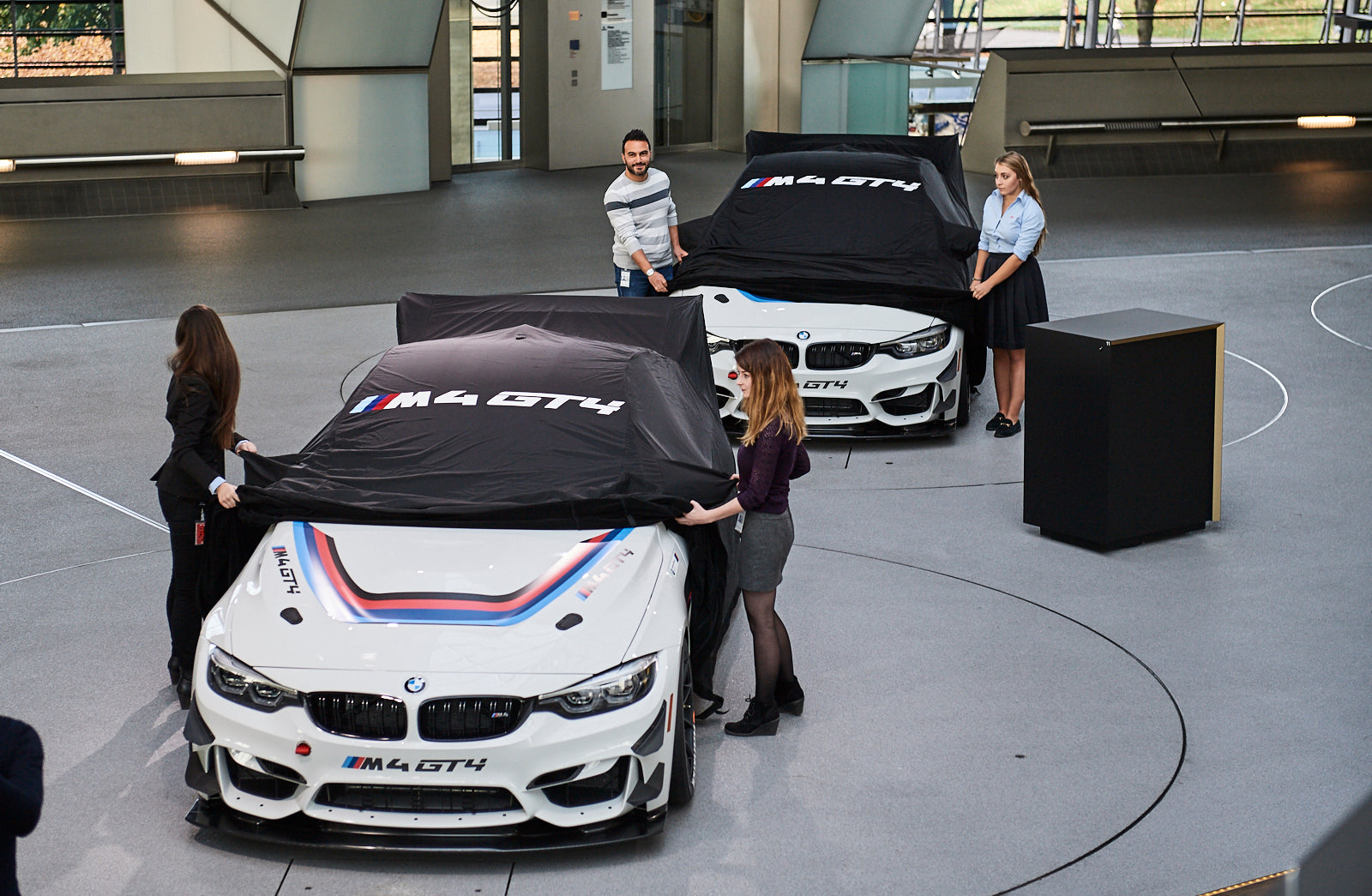 Newly developed BMW M4 GT4s delivered to customer teams for the first time.