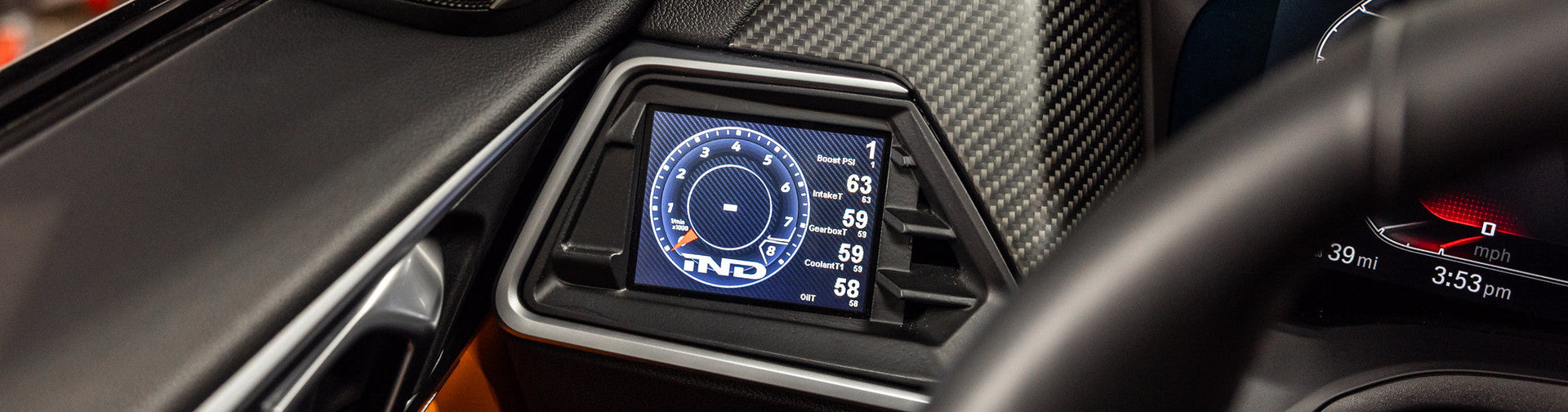 CANchecked MFD32 digital CAN bus display installed in BMW G8X M2 M3 M4 interior showing real-time engine data and vehicle telemetry