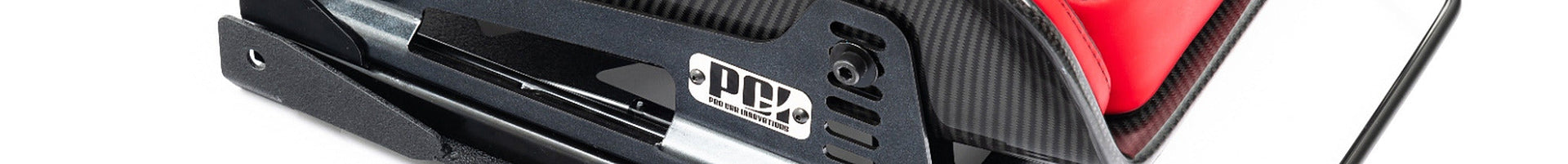 Pro Car Innovations seat mount bracket installed on a carbon fiber Recaro racing seat, shown on a white background highlighting the precision-engineered mounting solution and lightweight motorsport construction.
