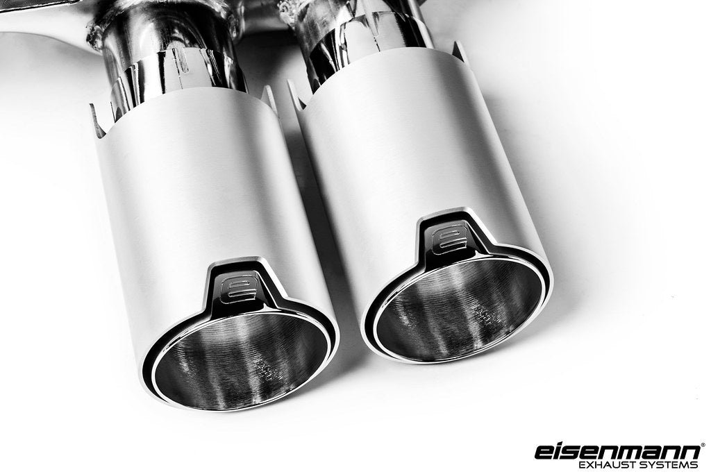 Eisenmann F8X M3 M4 performance exhaust system with valves, showing polished metal pipes and dual exhaust tips.