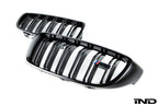BMW F8X M3 M4 Competition front grille set by IND, showing sleek exterior grille with black finish and sporty design details.