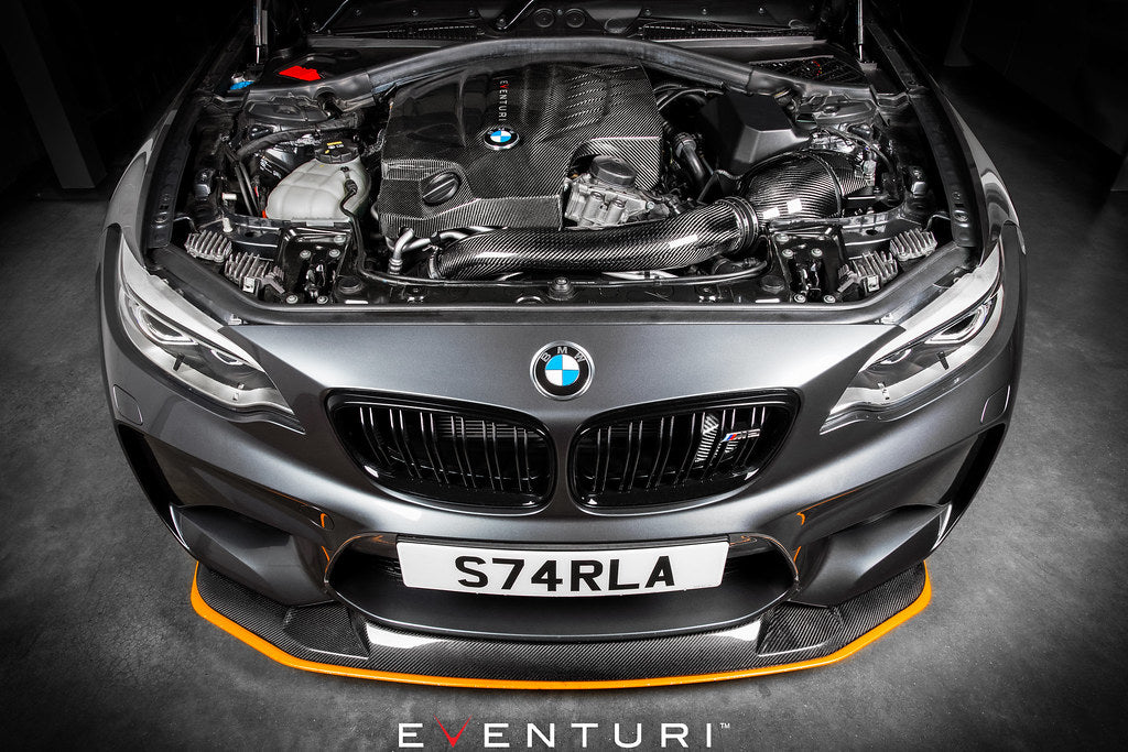 Black carbon engine cover for BMW F-Chassis N55 from Eventuri, showcasing a sleek, performance-oriented design.