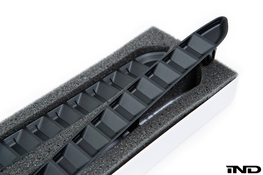 Acexxon F87 M2 rear reflector insert set with horizontal slats for vehicle exterior, showing reflective surface and mounting details.
