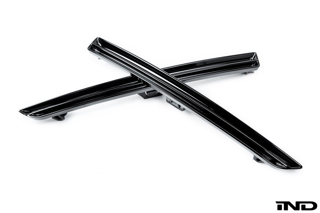 IND exterior F8X M3/M4 reflector cosmetic package with sleek design and reflective surfaces for improved vehicle aesthetics.