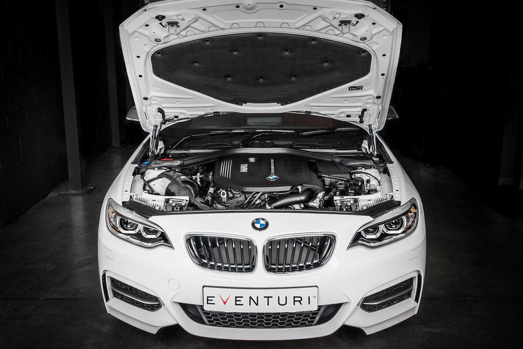 Eventuri black carbon intake system for BMW F-Chassis B58 engine, showcasing sleek performance-oriented design.