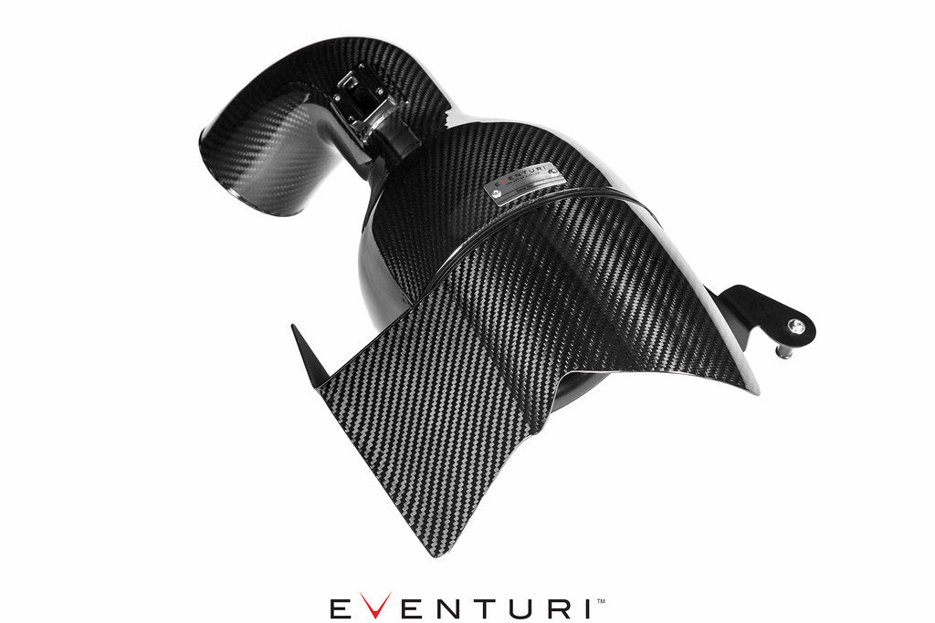 Eventuri BMW F-Chassis B58 black carbon intake system showing sleek air intake tubes and carbon fiber finish.