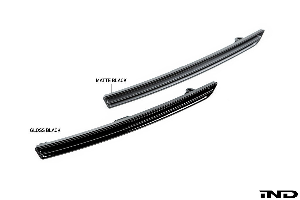 Exterior IND x Acexxon F8X M3 / M4 reflector cosmetic package showcasing sleek design and high-quality finish on a vehicle.