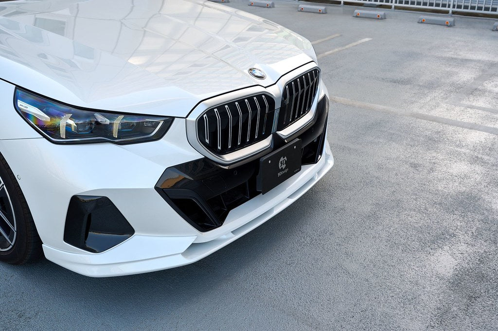 3D Design urethane front lip spoiler installed on a BMW G60 G61 5-Series and i5 M60 M Sport featuring OEM+ styling and factory-quality fitment