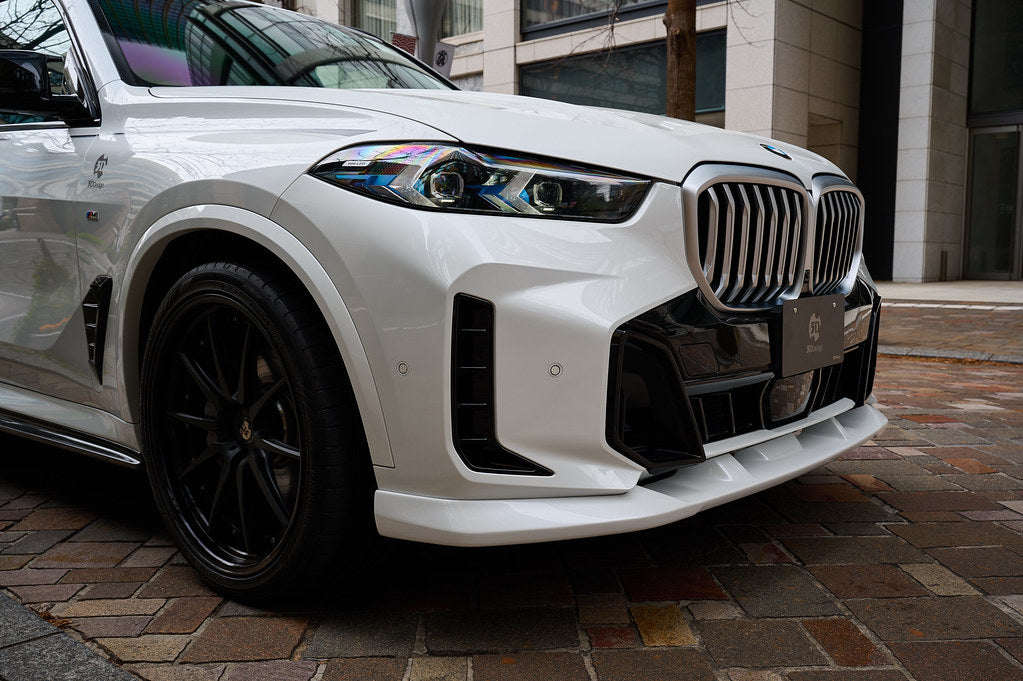 3D Design G05 X5 LCI front lip spoiler installed on BMW X5 M Sport, showcasing sleek exterior automotive styling.