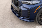 3D Design G05 X5 LCI front lip spoiler painted and installed on vehicle, enhancing exterior style and aerodynamic performance.