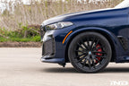 3D Design G05 X5 LCI front lip spoiler painted and installed on the BMW X5 exterior, enhancing sporty appearance and aerodynamics.