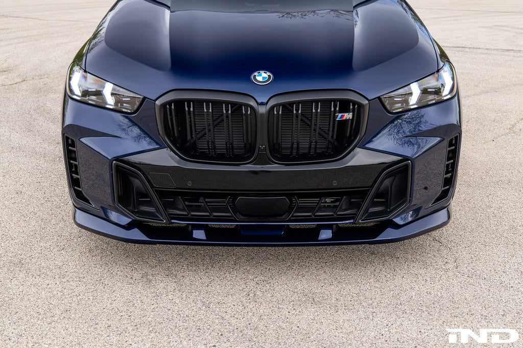3D Design G05 X5 LCI front lip spoiler painted and installed on vehicle, enhancing exterior sporty appearance.
