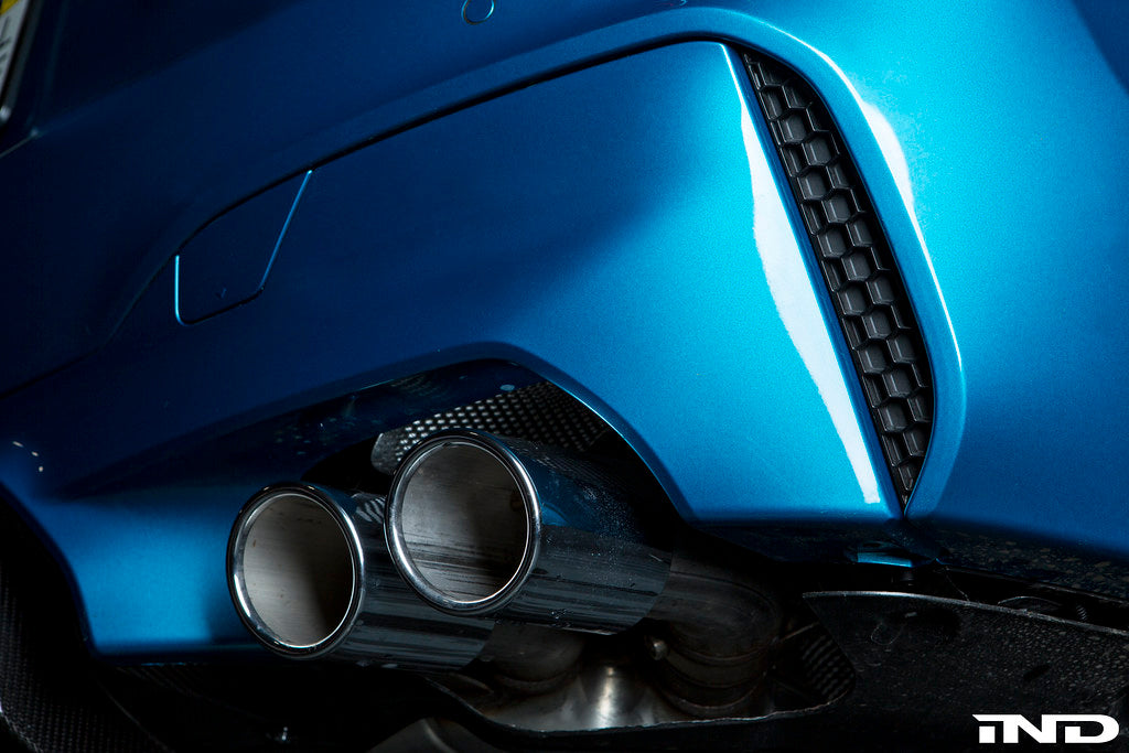 Acexxon F90 M5 rear reflector insert set with honeycomb design for exterior car customization.