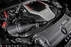 Eventuri Audi B9 S4/S5 black carbon performance intake system showing sleek carbon fiber components and airflow design.