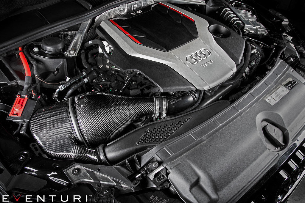 Eventuri Audi B9 S4/S5 black carbon performance intake system showing sleek carbon fiber components and airflow design.