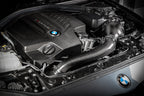 Eventuri black carbon engine cover for BMW F-Chassis N55 performance upgrade, showcasing sleek, high-quality engine protection.