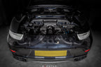 Eventuri black carbon intake system for Porsche 991 Turbo and Turbo S with sleek design and performance-enhancing features.