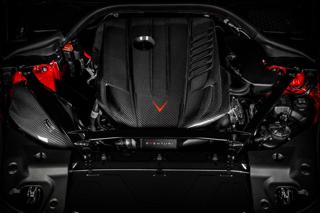 Eventuri black carbon engine cover for G29 Z4 and A90 Supra B58, exterior view showing sleek design and branding.