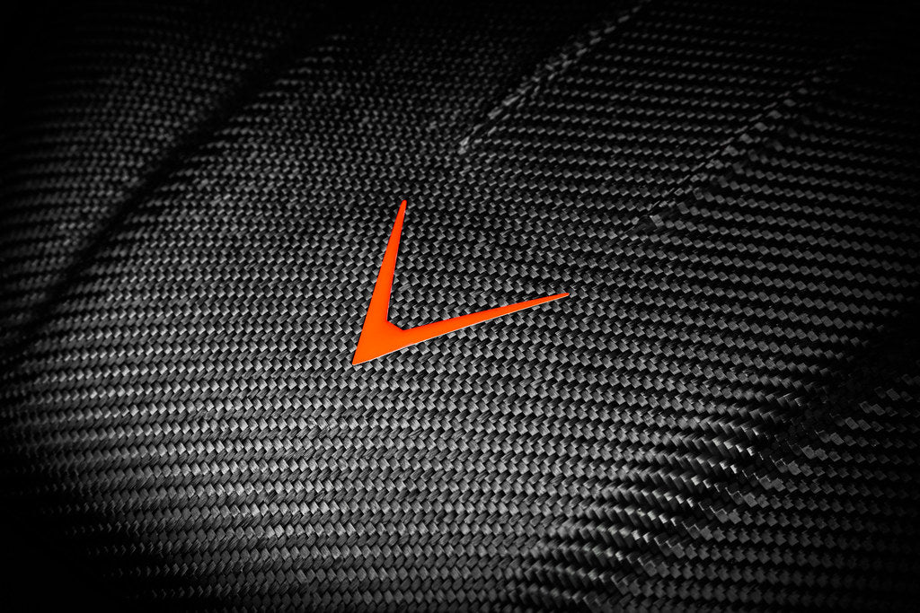 Eventuri black carbon engine cover for G29 Z4 and A90 Supra with B58 engine, exterior shot showing sleek, aerodynamic design.