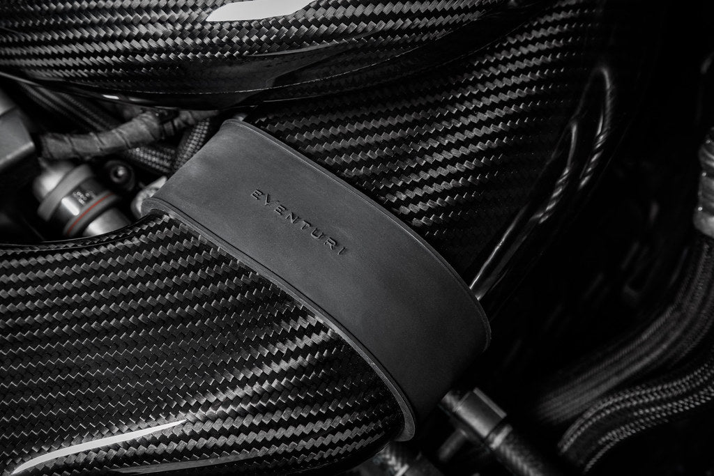 Eventuri black carbon V2 duct upgrade kit for Mercedes W205 C63/C63S AMG, showcasing sleek design and performance features.