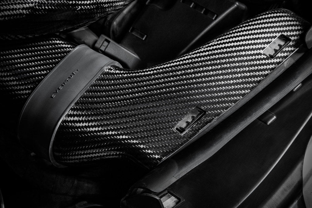 Eventuri black carbon V2 duct upgrade kit for Mercedes W205 C63/C63S AMG, showcasing sleek design and performance features.