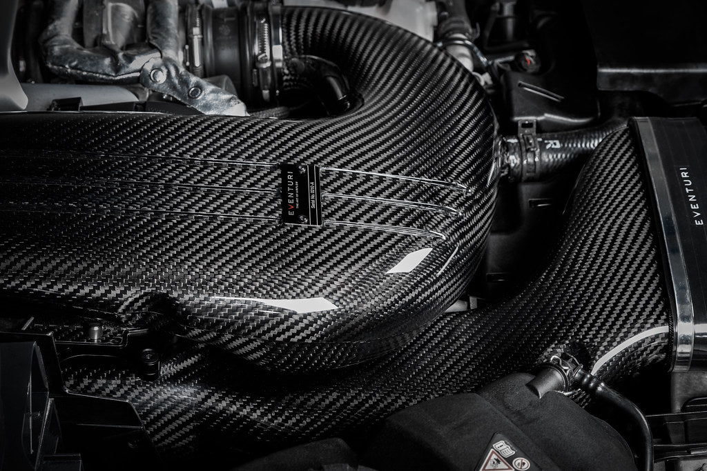 Eventuri Mercedes GLC63S AMG black carbon intake system showcasing sleek design and high-performance features.