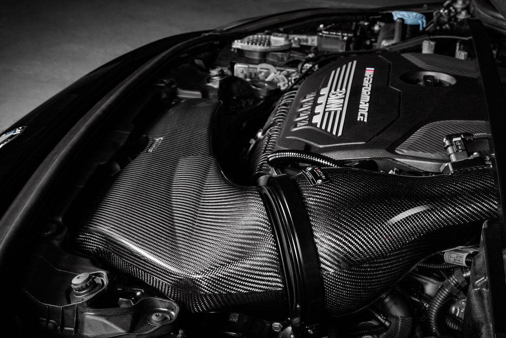 Eventuri black carbon intake system for BMW F4X M135i, M235i, F39 X2 35i B48, performance upgrade with carbon fiber components.