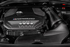 Eventuri black carbon intake system for BMW F4X M135i M235i and F39 X2 35i B48 performance upgrade, showing sleek carbon design.