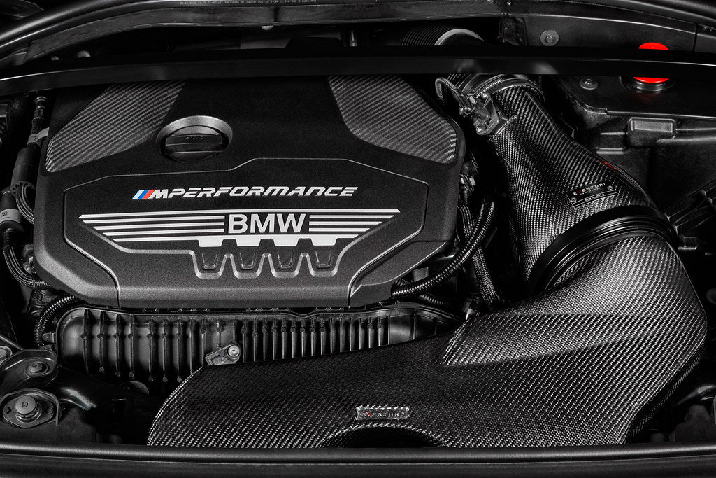Eventuri black carbon intake system for BMW F4X M135i M235i and F39 X2 35i B48 performance upgrade, showing sleek carbon design.