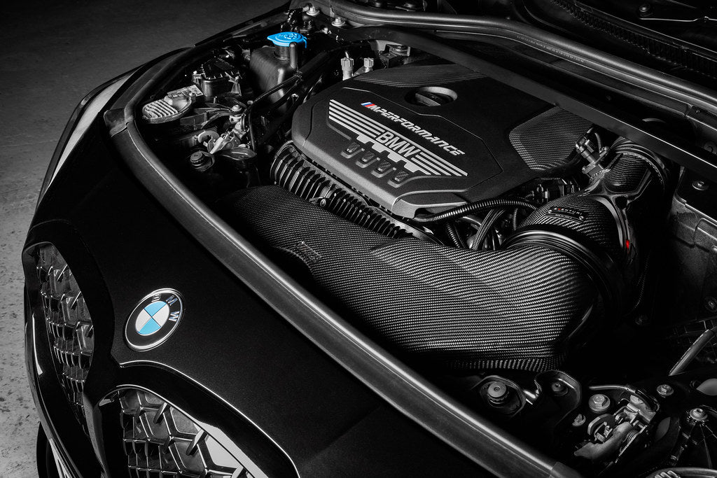 Eventuri black carbon intake system for BMW F4X M135i M235i and F39 X2 35i B48, showcasing high-performance car parts.