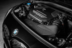Eventuri black carbon intake system for BMW F4X M135i M235i and F39 X2 35i B48, showcasing high-performance car parts.