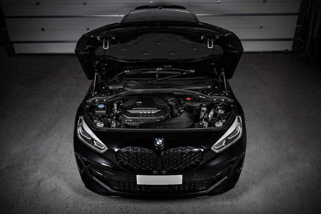 Eventuri black carbon intake system for BMW F4X M135i M235i and F39 X2 35i B48 performance engine, with detailed black carbon construction.