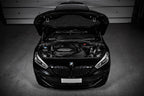 Eventuri black carbon intake system for BMW F4X M135i M235i and F39 X2 35i B48 performance engine, with detailed black carbon construction.