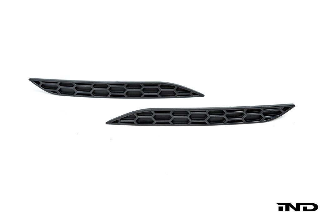 Acexxon F22 M-Sport rear reflector insert set with a honeycomb design for enhanced exterior style and visibility.