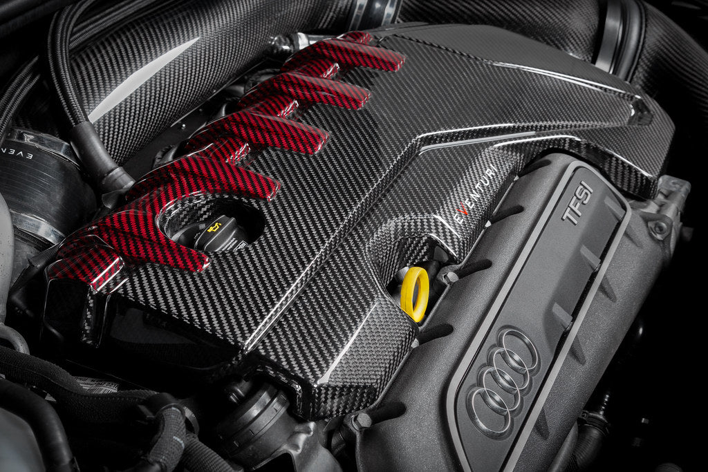 Eventuri Audi RS3 TTRS black carbon and red kevlar engine cover exterior view showing detailed craftsmanship and sporty design.