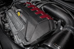 Eventuri Audi RS3 TTRS black carbon and red Kevlar engine cover exterior view, showcasing sleek and sporty design details.
