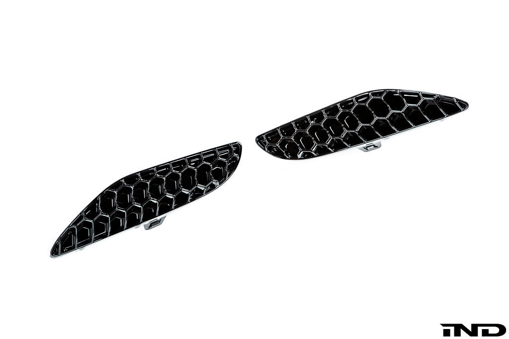 Acexxon F95 X5M / F96 X6M rear reflector insert set with 3D honeycomb design for exterior use, showcasing reflective surface.