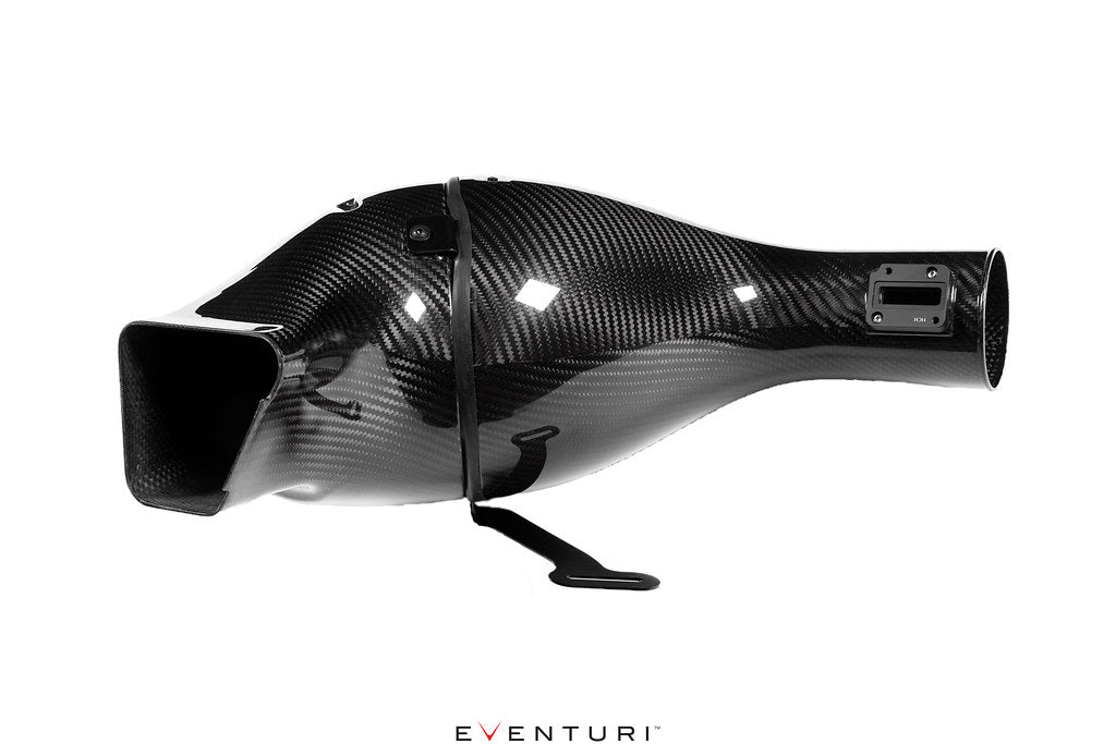 Eventuri Lamborghini Huracan V10 black carbon intake system, close-up view of the performance car part showing detailed carbon fiber construction.