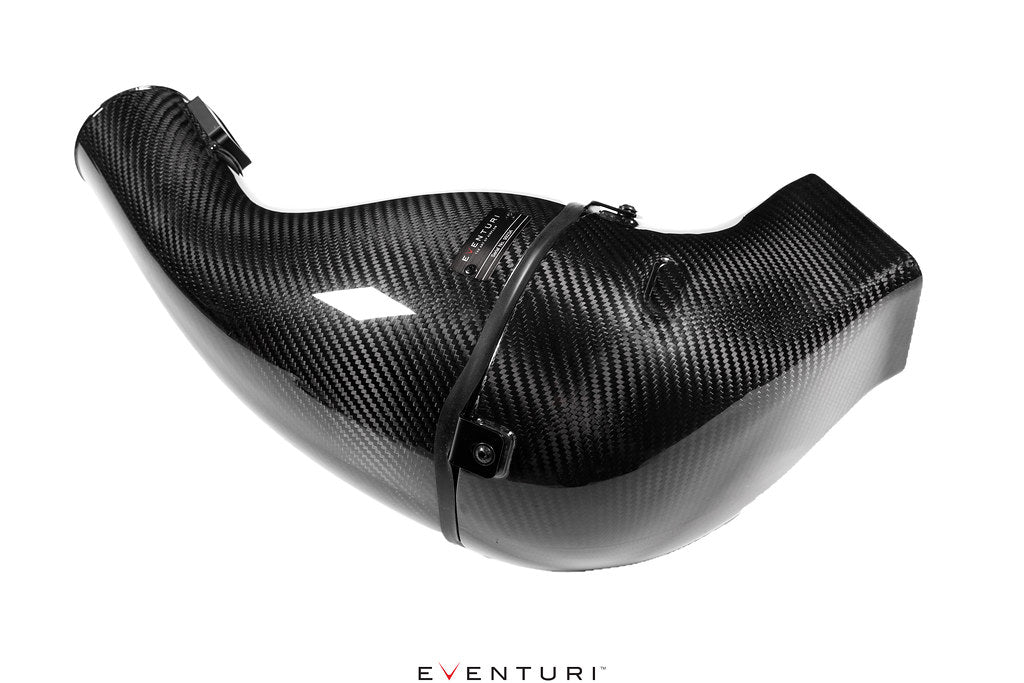 Black carbon intake system for Lamborghini Huracan V10 by Eventuri, showcasing high-performance automotive engine components.