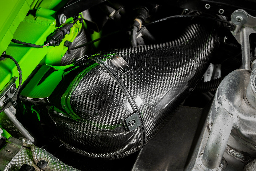 Eventuri Lamborghini Huracan V10 black carbon intake system showing sleek, high-performance air intake with carbon fiber detailing.