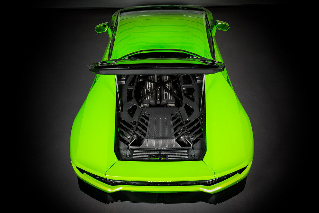 Eventuri Lamborghini Huracan V10 black carbon intake system installed, showcasing sleek performance-enhancing design and high-quality materials.