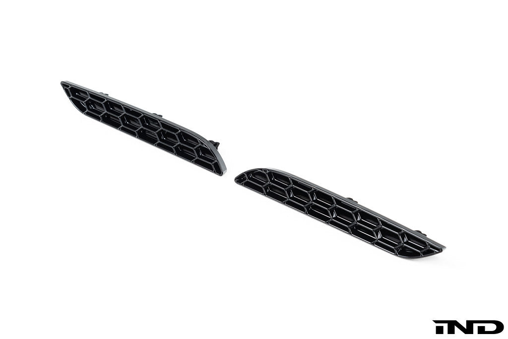 Acexxon G42 2-Series M-Sport rear reflector insert set in honeycomb design for exterior vehicle styling.